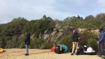 Hiker wearing comfortable outdoor clothing on a scenic mountain trail