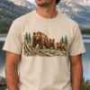 t-shirt featuring a mother bear and two cubs in a detailed forest wildlife illustration